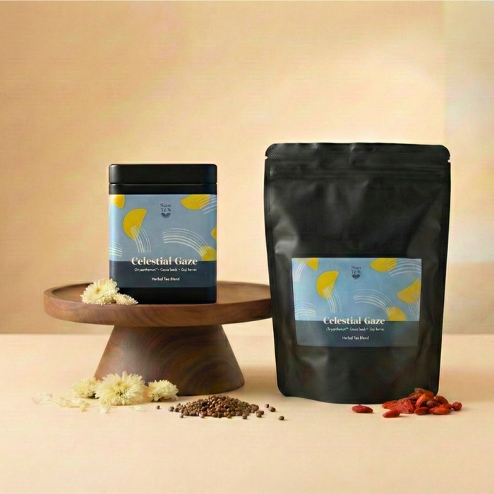 Celestial Gaze herbal tea blend by Sian Te, shown in both tin and pouch packaging in a product display