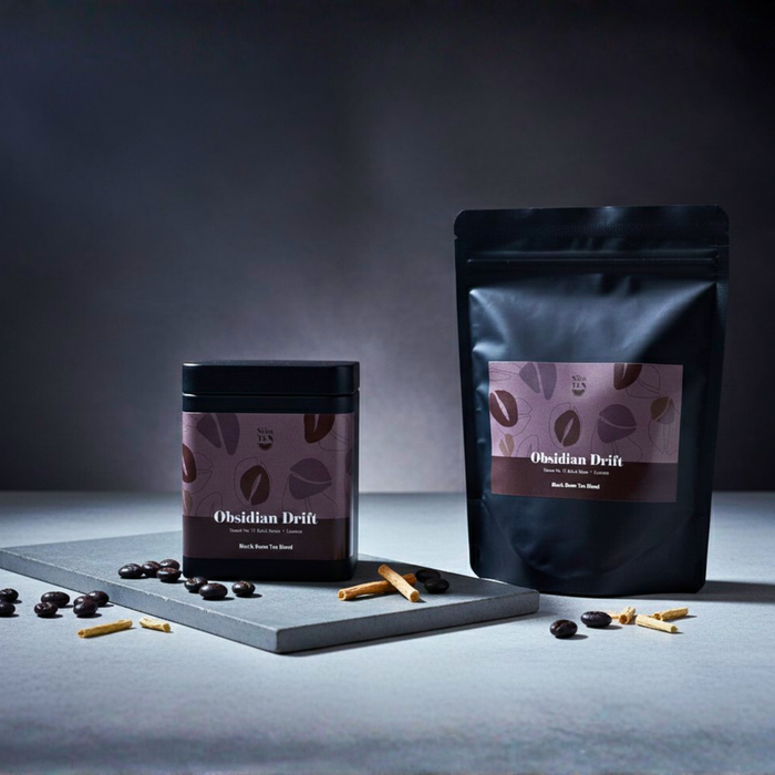 Obsidian Drift black bean tea blend by Sian Te, shown in both tin and pouch packaging in a product display.
