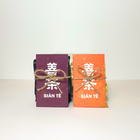 A duo set of Sian Te teas, featuring a calming honey-flavored chrysanthemum tea and a rich, premium roasted black bean tea.